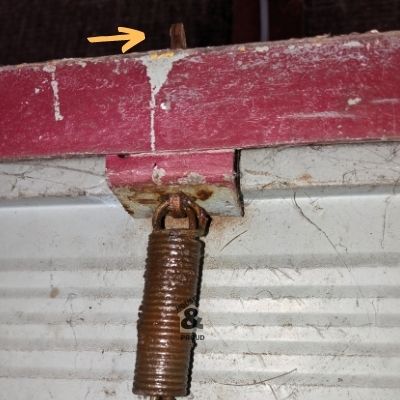 locking mechanism at the top of a garage door