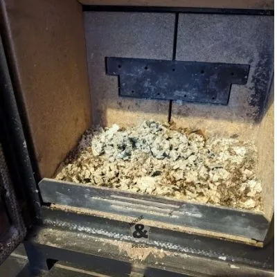 Wood burning stove with 1 inch of ash in it